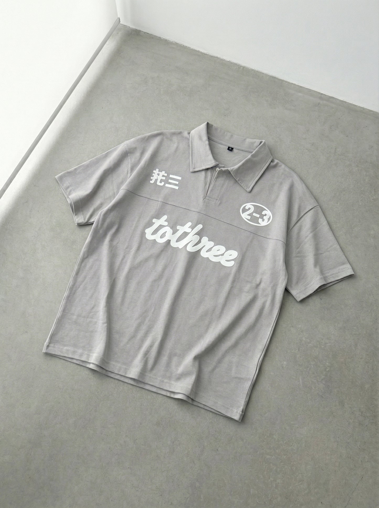 DOUBLE IDENTITY BRUSHED SILVER POLO